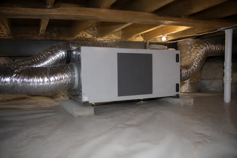 Déshumidificateur à adsorption installé pour assainir l'humidité du vide sanitaire